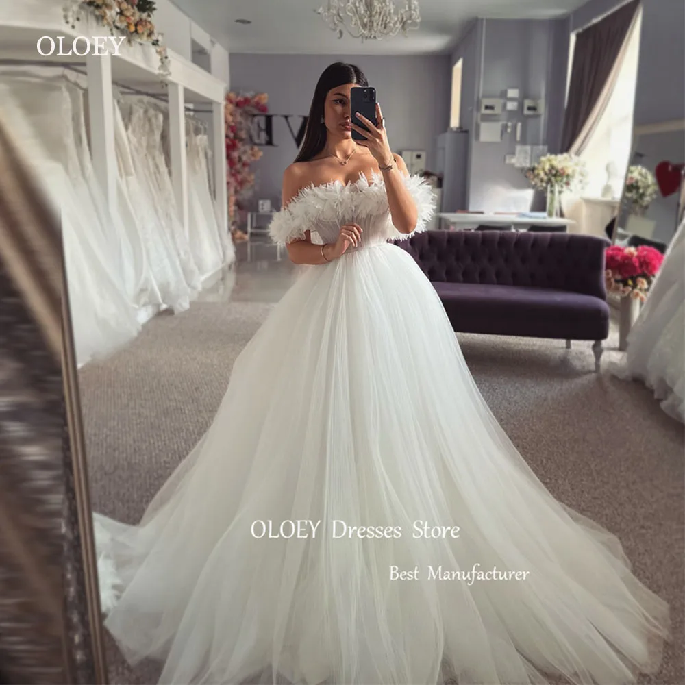 

OLOEY Sexy Off Shoulder Tulle A Line Wedding Dresses noivas Princess Sweetheart Puff Long Sleeves Sweep Train Bridal Gowns