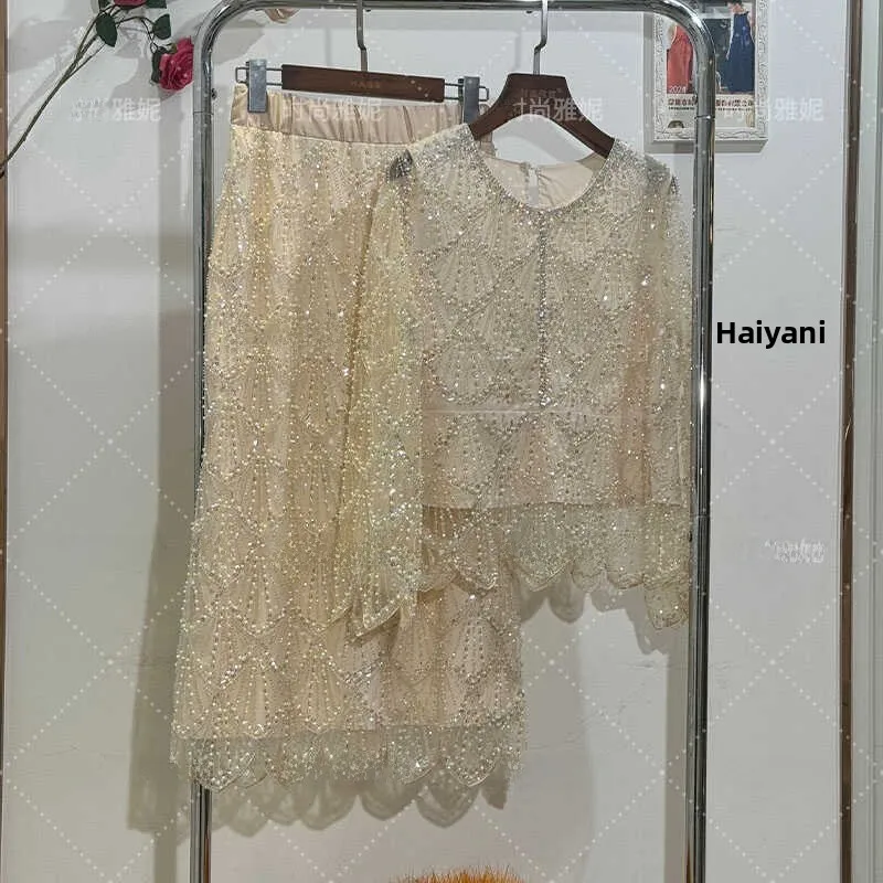 

Faionable Long Sve Top And Mid-Length Skirt with Diamond Embelliments for Women Ele Pearl Embroidery Polyester Mat...