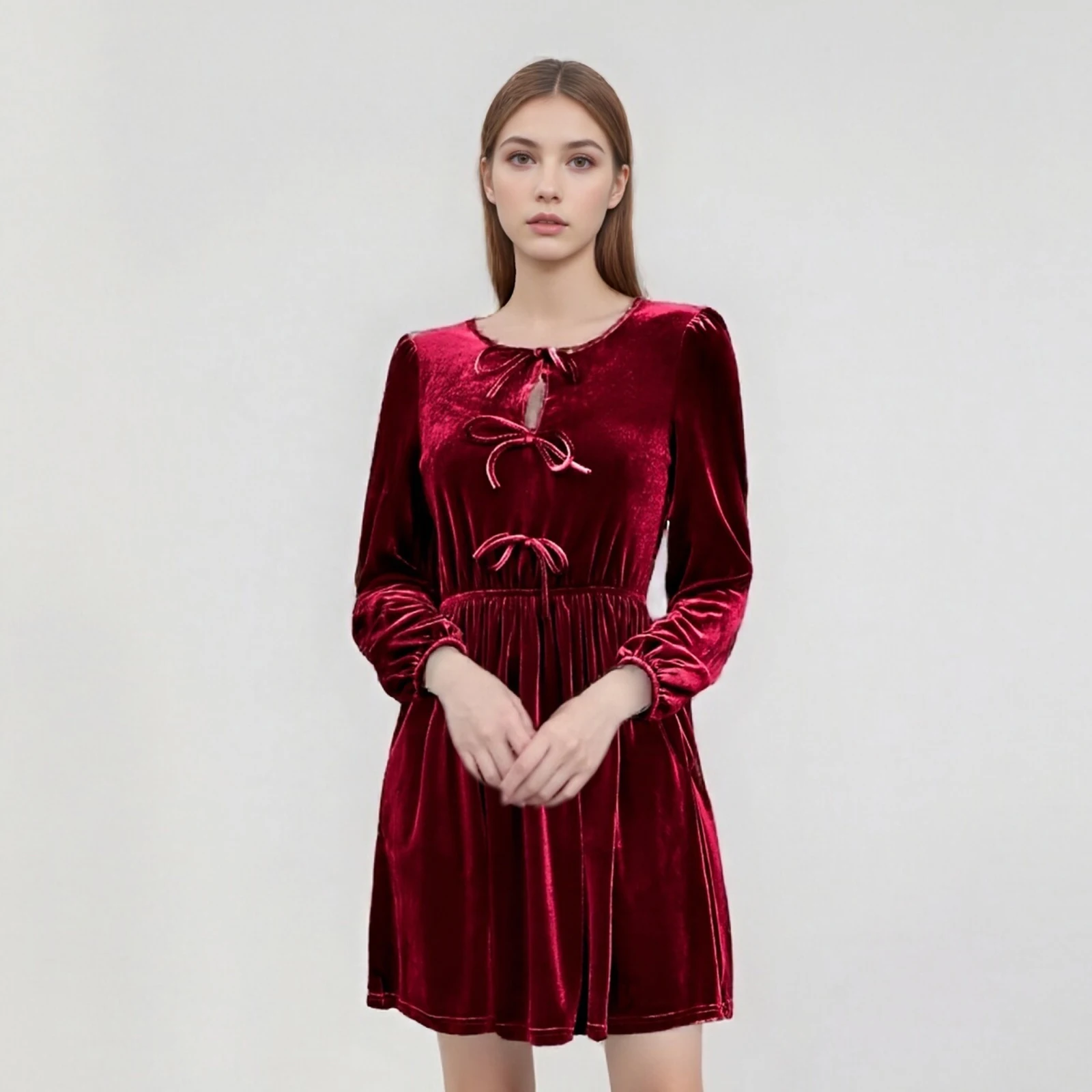 

Элегантное женское мини-платье А-силуэта из бархата однотонного цвета с длинным рукавом, круглым вырезом и бантом спереди