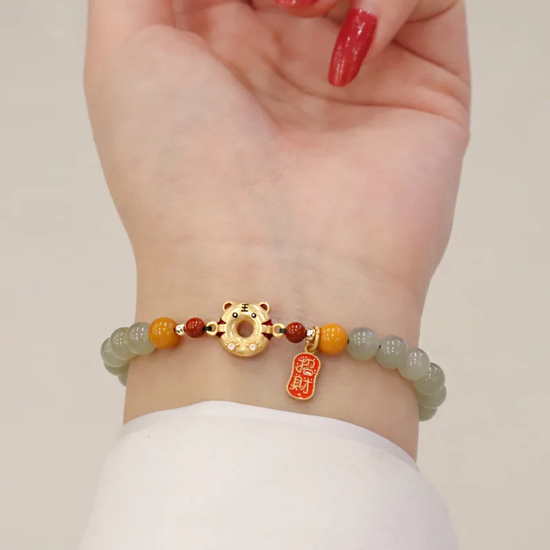 

Fortune-Attracting Pure Silver Natural Hetian Jade Bracelet with Amber Handwoven Cord, Symbolizing Prosperity and Protection