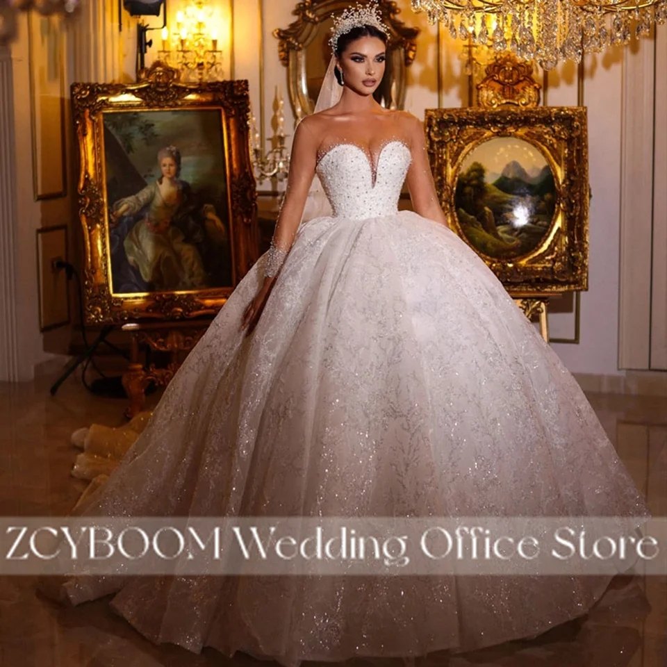 Squisito abito da ballo scintillante perline abiti da sposa con collo trasparente 2025 principessa illusione maniche lunghe abiti da sposa abiti da noiva