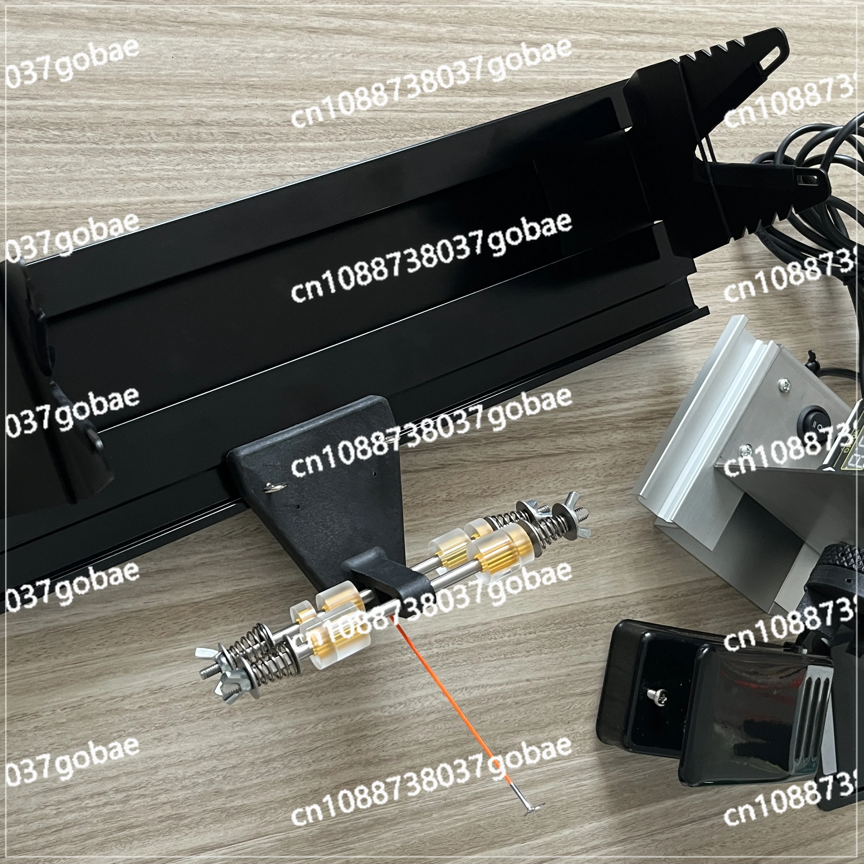 

Mechanical fishing rod winding machine, which can adjust the speed and wire winding brush epoxy through the foot pedal