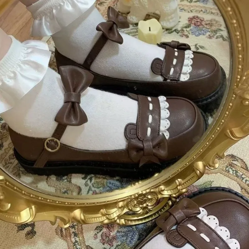 أحذية نسائية مسطحة ربيعية جديدة برأس مستدير وفم ضحل وعقدة على شكل فراشة ونعل سميك أحذية مانعة للانزلاق