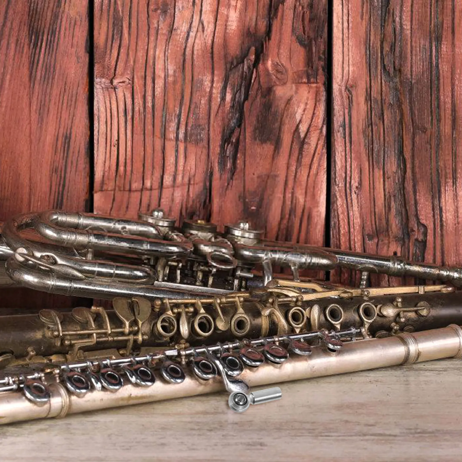 

Высокоточные стальные компоненты для ремонта духовых инструментов: гибкий шарнир для плавной работы на концертах