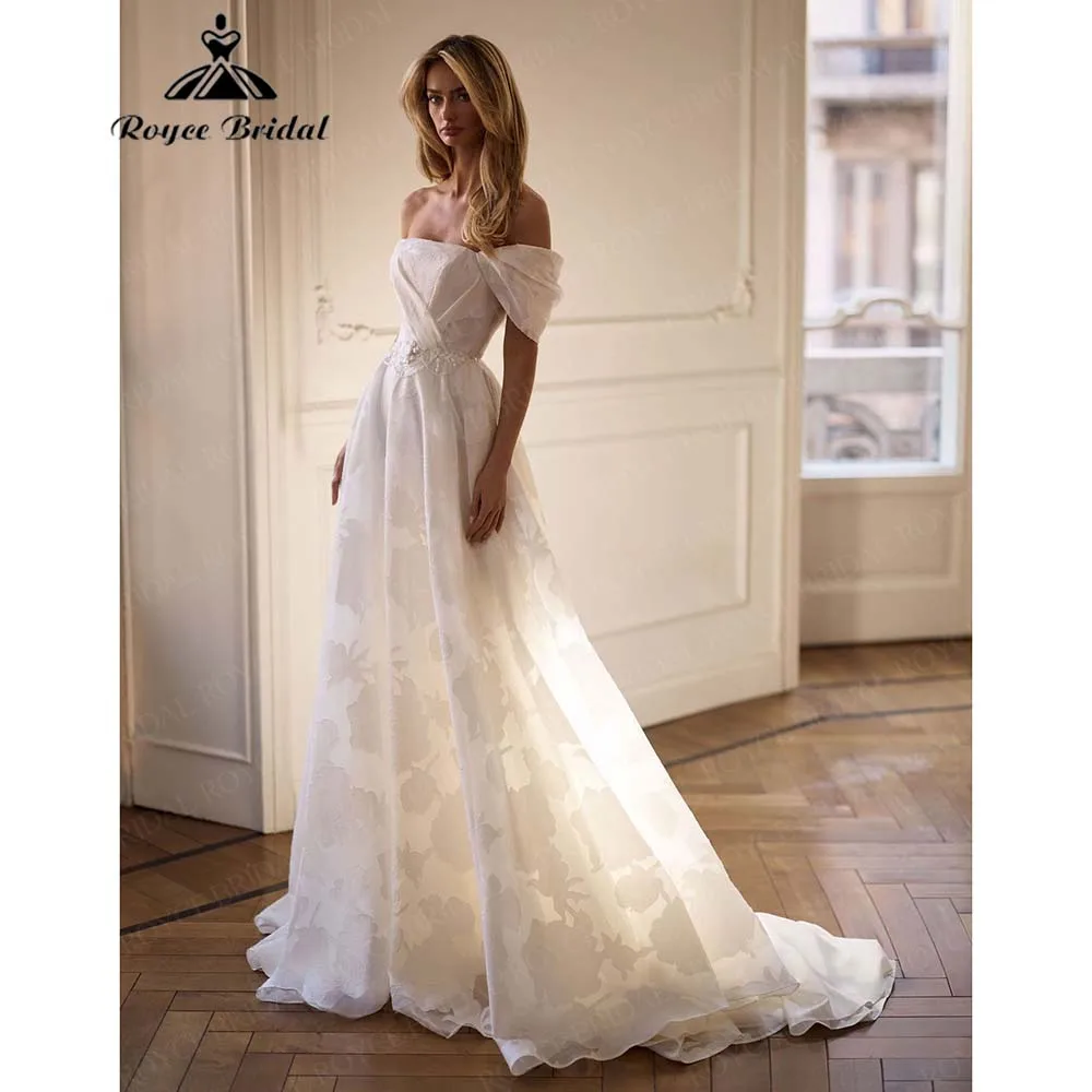 فساتين زفاف رقيقة خارج الكتف على شكل حرف a 2026 جيب مطرز بالخرز سويب تراين دانتيل فستان العرائس Vestidos De Novia مخصص