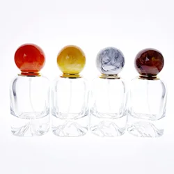 New perfume bottle 50ml volcanic bottom bayonet perfume bottle crystal white glass resin cap perfume bottle Refillable Bottles