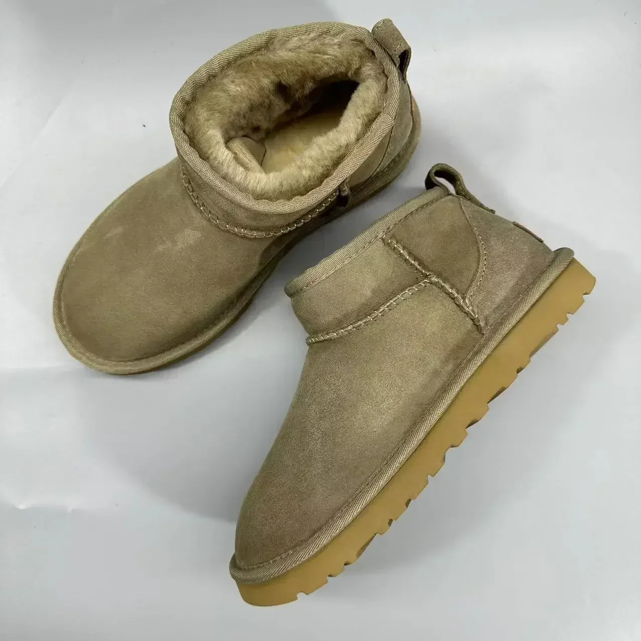 Botas curtas de lã de carneiro real para homens e mulheres, sapatos de pele quente para senhoras, botas de neve de alta qualidade inverno