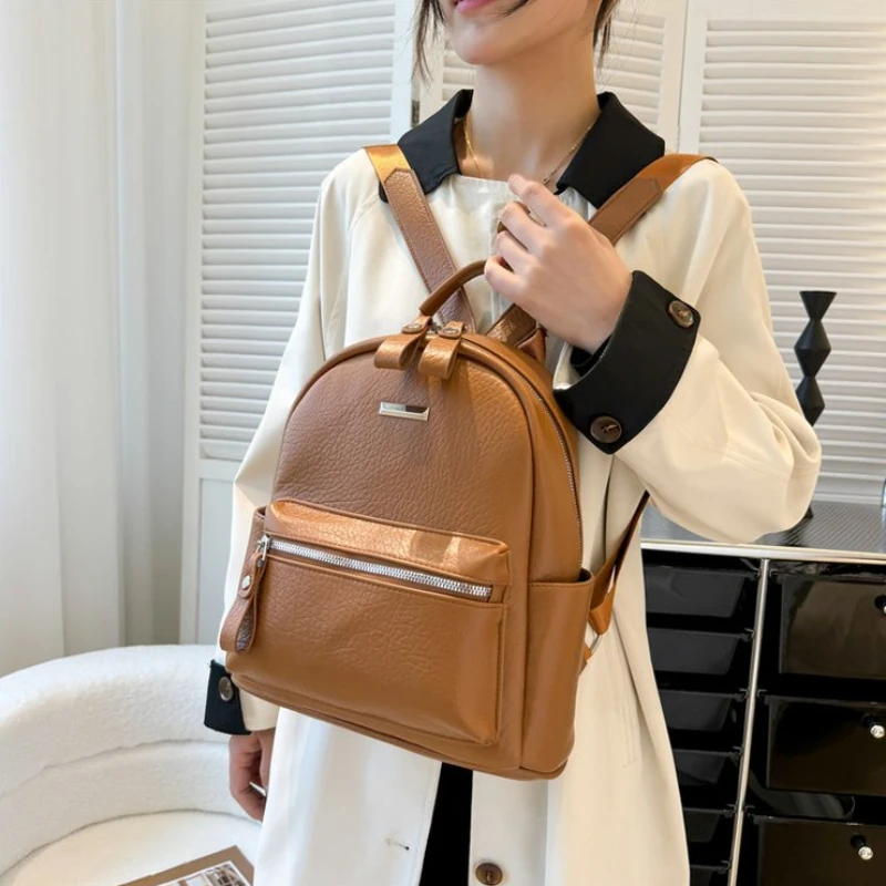 Sac à dos à fermeture éclair solide en PU pour femme, cartable de style classique, grande capacité, haute qualité, mode, 2025, en vente