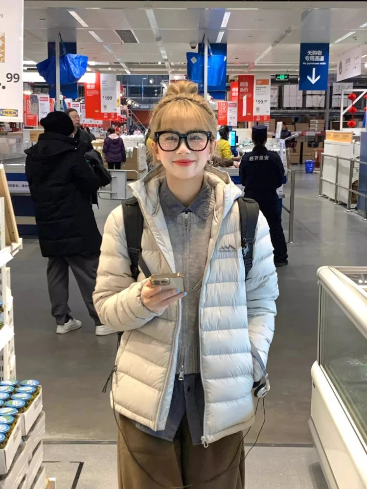 เสื้อโค้ทกันหนาวแบบมีซิปสำหรับผู้หญิง ผ้าฝ้ายผสมใยขนเป็ด ทรงเข้ารูป น้ำหนักเบา สไตล์เกาหลี แบบสั้น มีฮู้ด