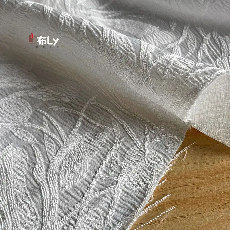 White Irregular Pattern 3D Jacquard Fabric for Designer Luxury Dress Pants Sewing Material
