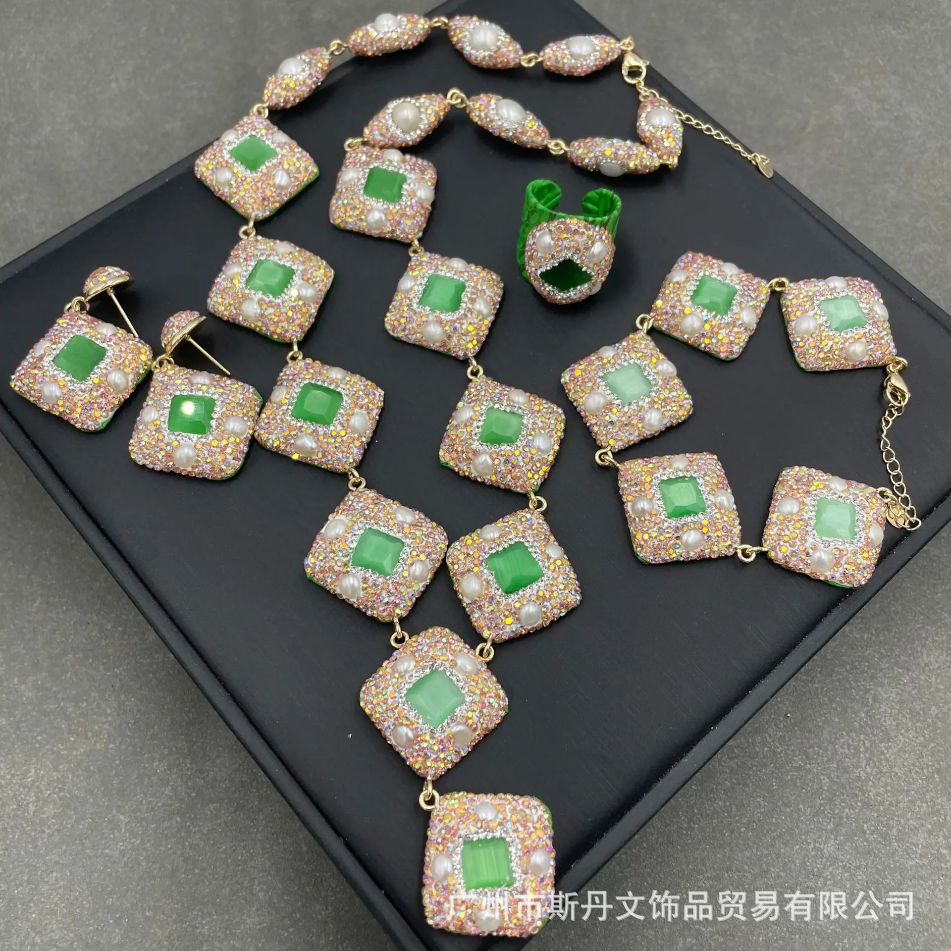 

Freshwater special-shaped pearl cat's eye jade set, fashionable luxury handmade point crystal necklace earrings, ring bracelet.