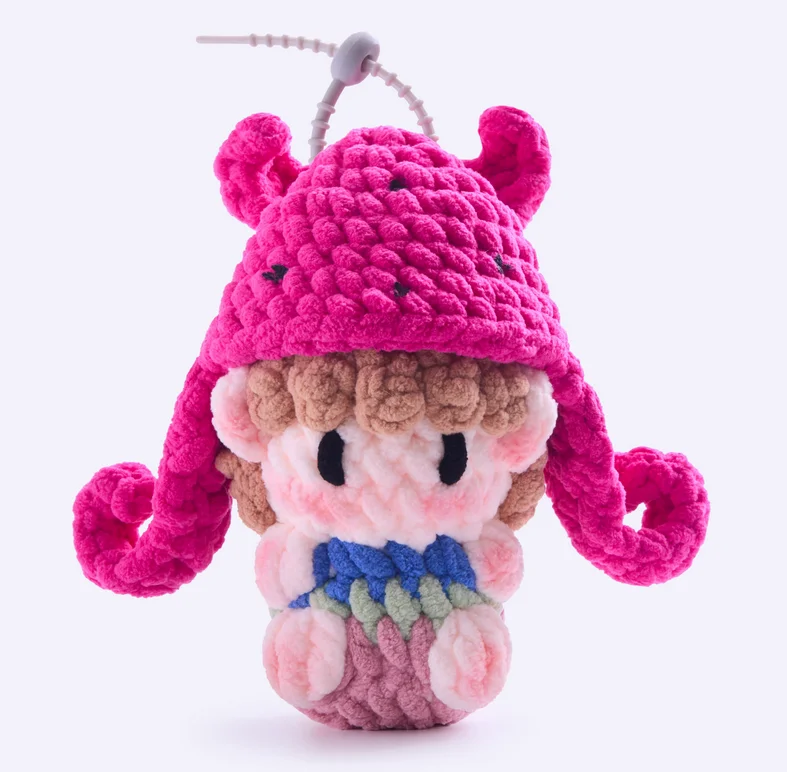 Gummy bear-themed merchandise, handmade crocheted dolls, concert support materials, and keychains.