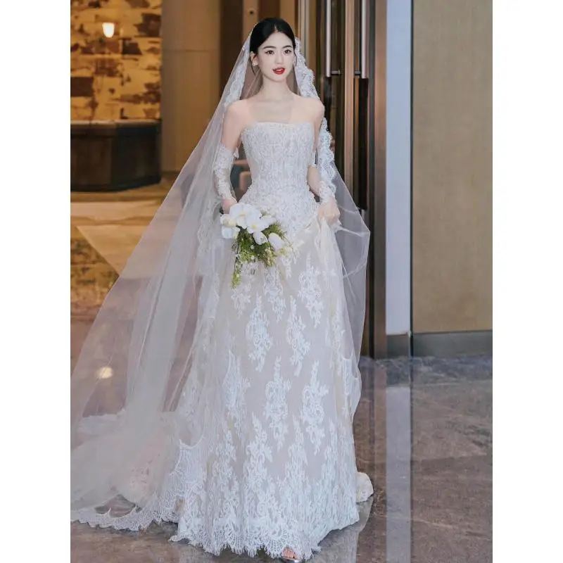 

Французское легкое свадебное платье без бретелек, высококачественная кружевная текстура, маленькая зродка, простая и элегантная длинная юбка по индивидуальному заказу