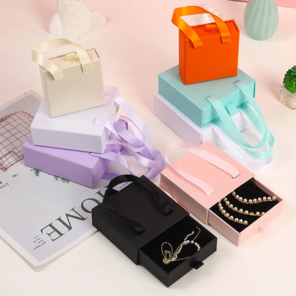 

50 шт. роскошный ящик для драгоценностей для колец, ожерелий, сережек, портативный подарочный футляр для хранения с черной губкой, бумажная упаковка для ювелирных изделий