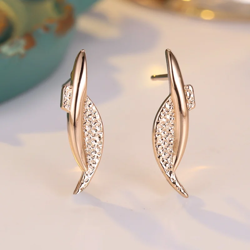 2026 New European and American Niche Design Curved Blade Earrings with Metal Concave Convex Texture Long Leaf Accessories