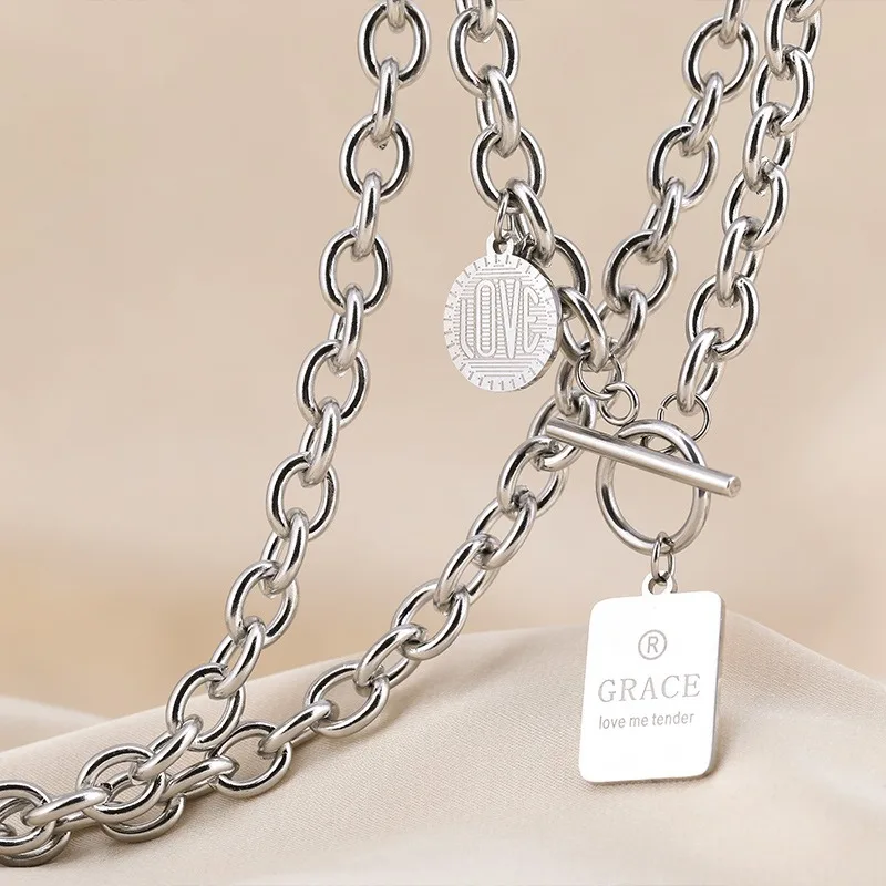 

Brand new titanium steel necklace, ladies' niche one-piece letter pendant, collarbone chain accessory, sweater chain