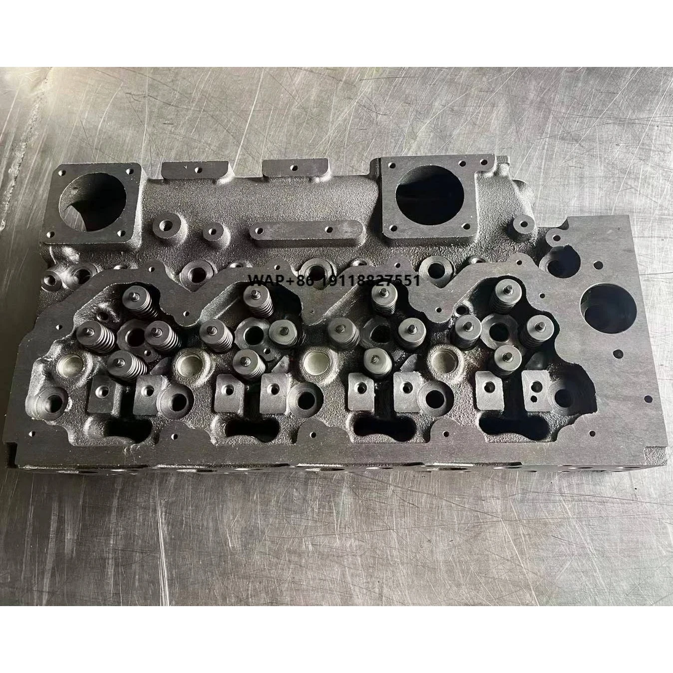 

Excavator Spare Parts E312D2 3054C C4.4 Cylinder Head Engine Parts 4 Valve Use for CAT and Perkins Engine 2327519