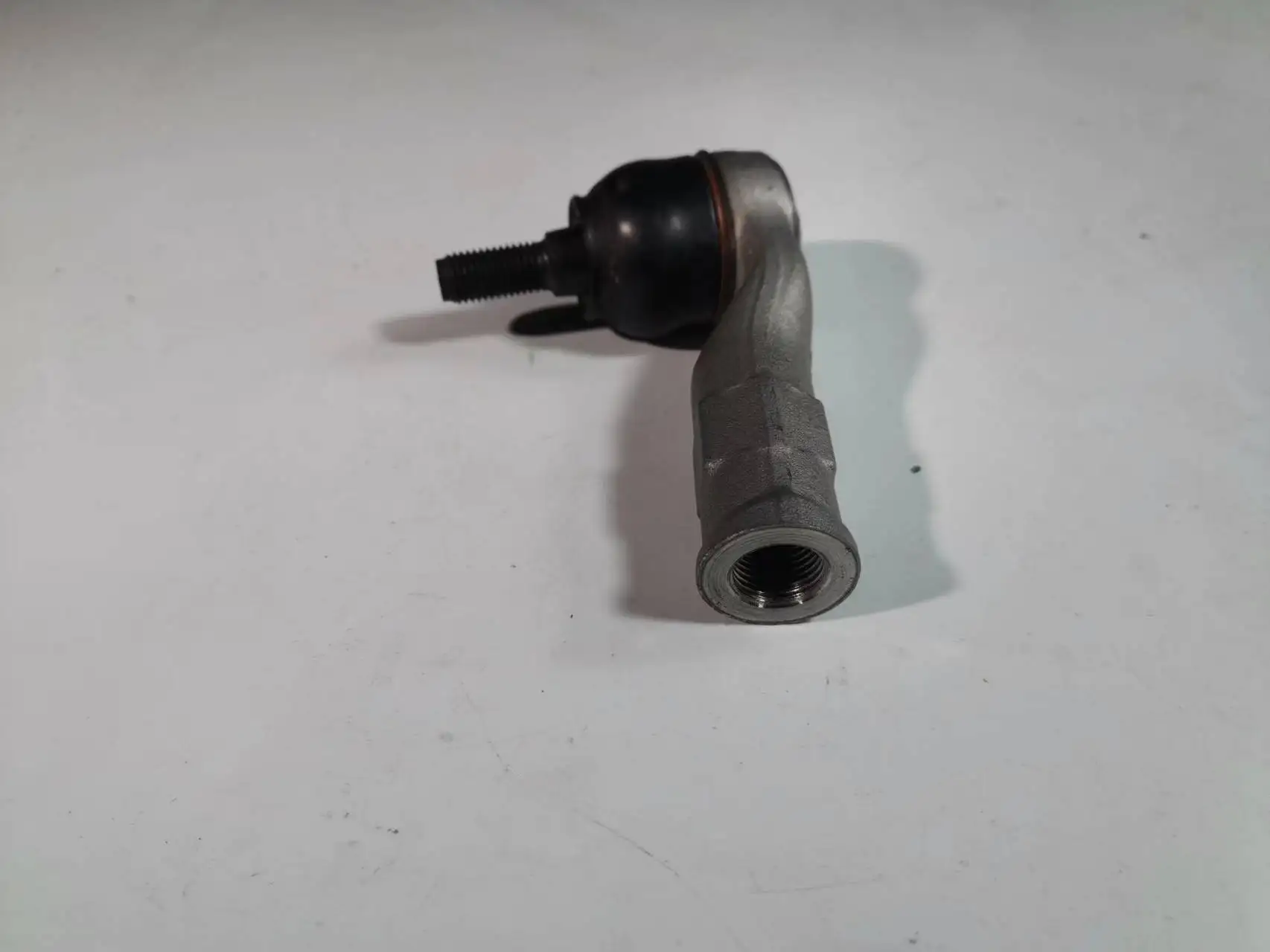 

Cross tie rod ball head