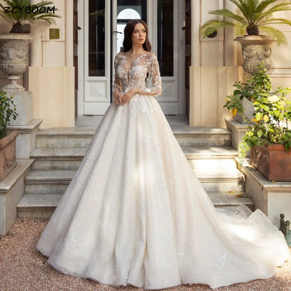 Luxury A-Line Illusion Long Sleeves Wedding Dresses 2022 Sweetheart Lace Appliques Glitter Sequined Bridal Gown Vestido De Novia