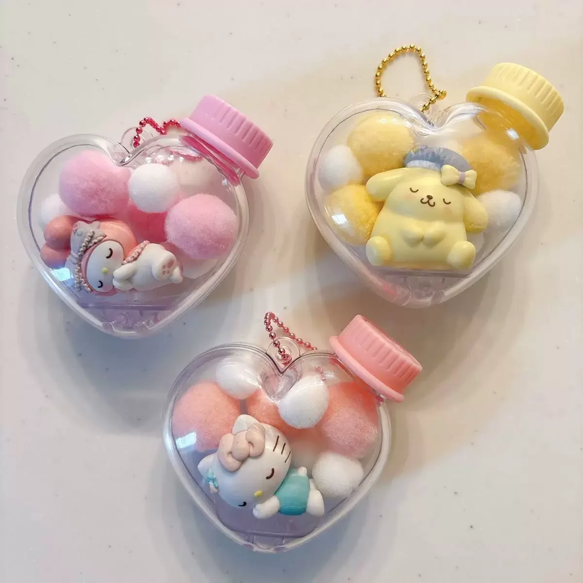 

New Sanrio Heart Shaped Transparent Storage Box Keychain Pendant With Fluffy Pom Poms Hellokitty Kuromi Hangyodon Bag Charm