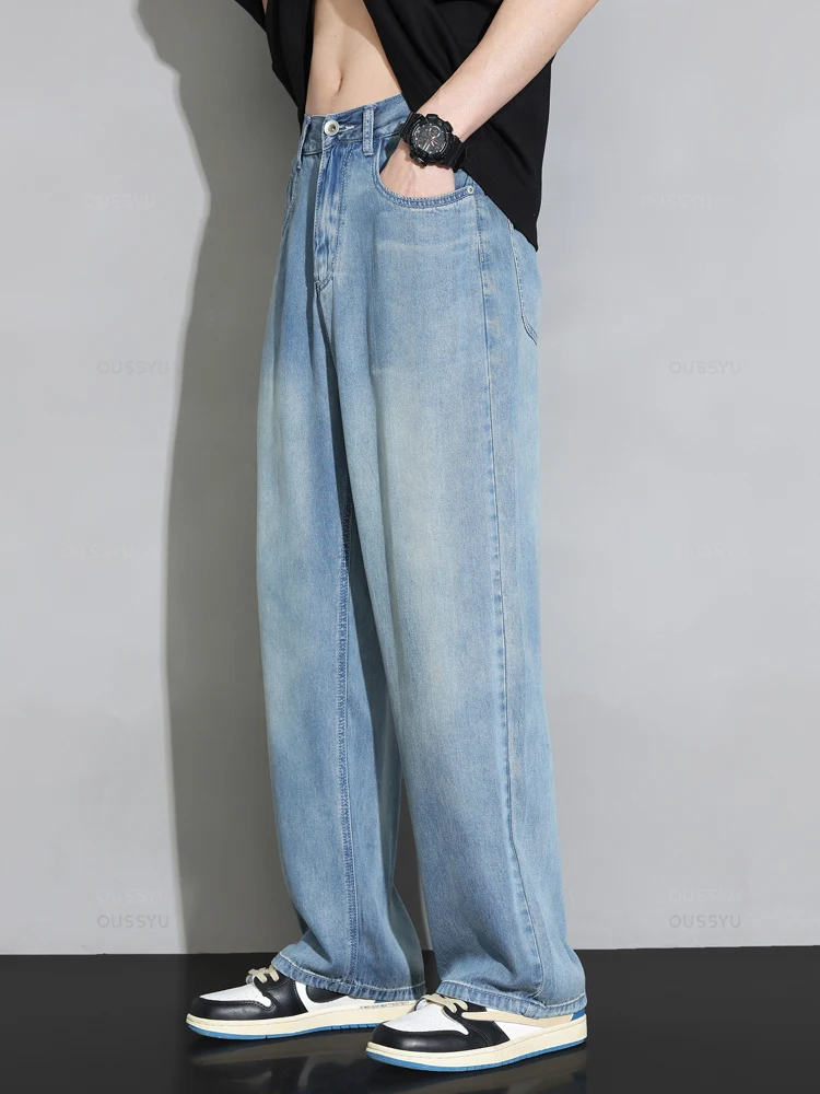 Letnie wysokiej jakości przytulne miękkie 100% Lyocell Jeans męskie spodnie dżinsowe z elastyczną talią Korea luźne, proste, niebieskie spodnie na