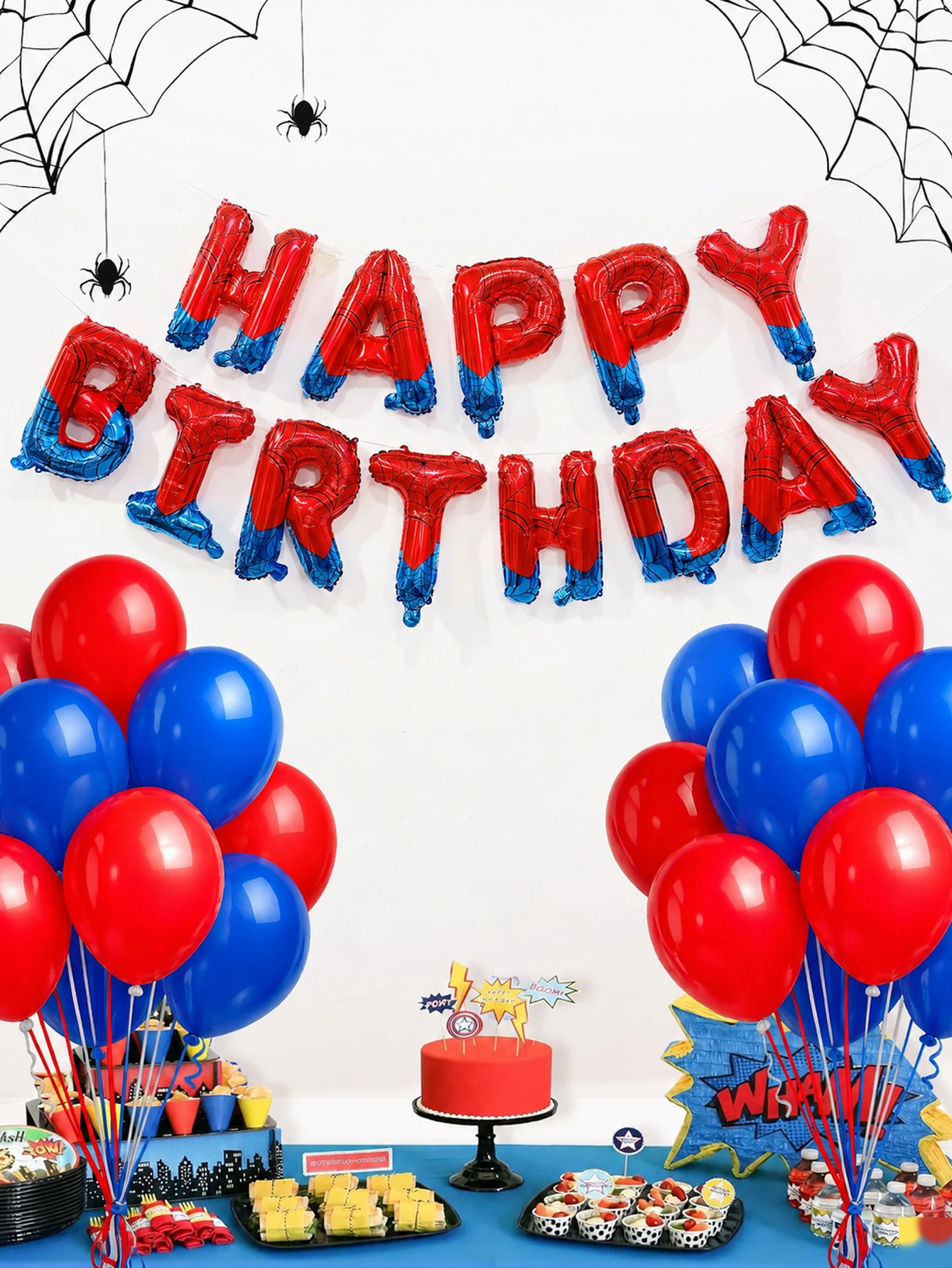 Juego de globos de cumpleaños con temática de arañas de 33 piezas – Incluye globos gigantes con degradado rojo y azul con la inscripción "Feliz Cumpleaños" y diseño de telaraña.