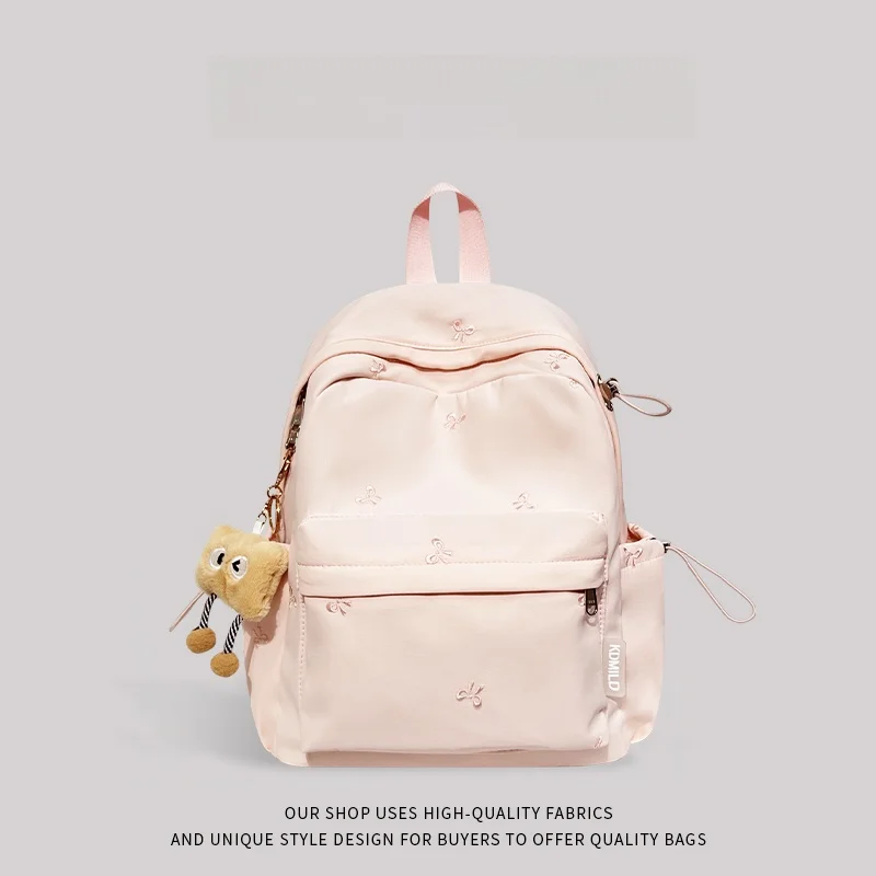 حقيبة مدرسية وردية اللون للفتيات جديدة 2025 المدرسة الثانوية بابا طبقة مزدوجة البوليستر المواد الداخلية سستة إغلاق استخدام الحرم الجامعي