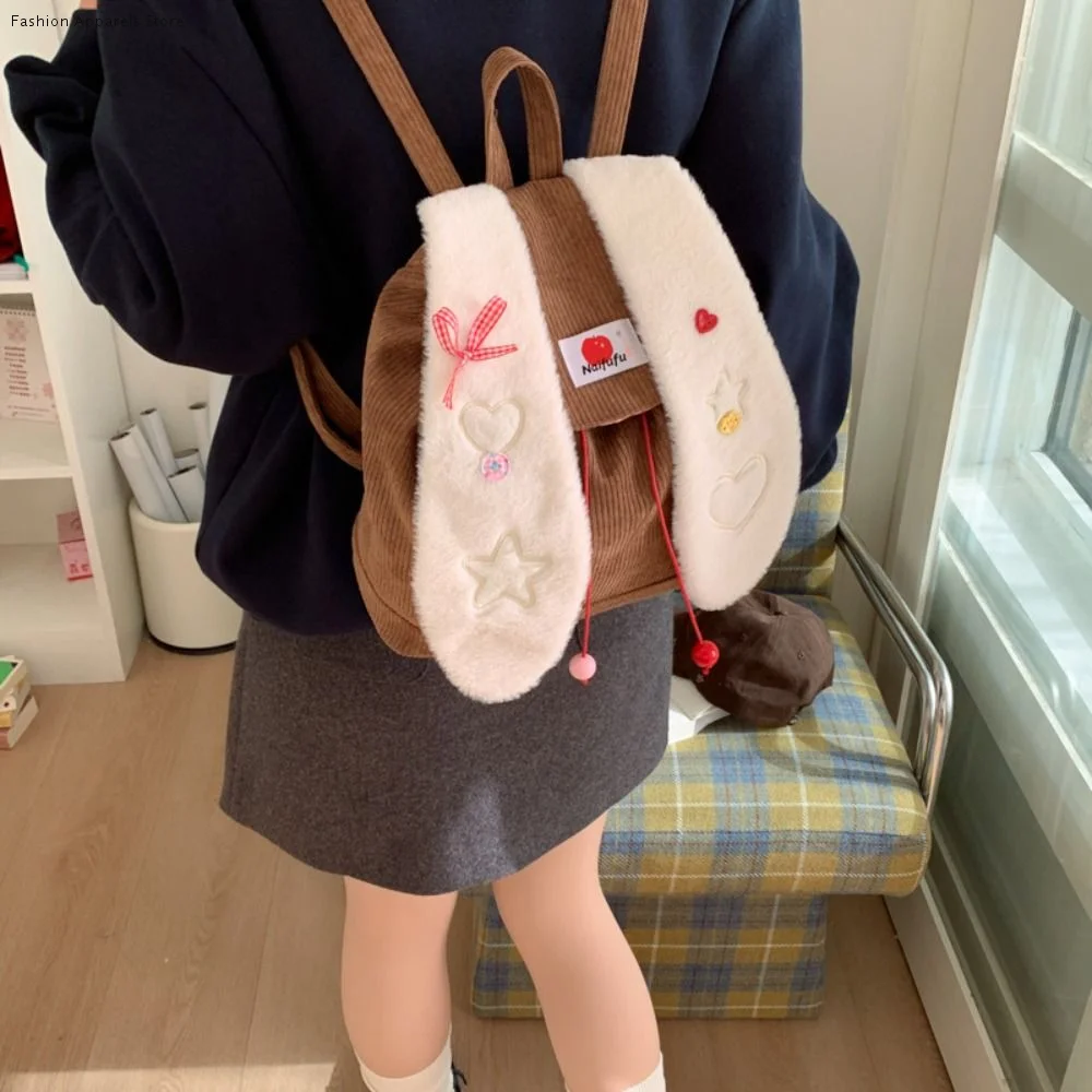 

Стильный рюкзак с ушками кролика, большой вместимости, с бантом и шнурком, легкий, портативный, для студентов и женщин.