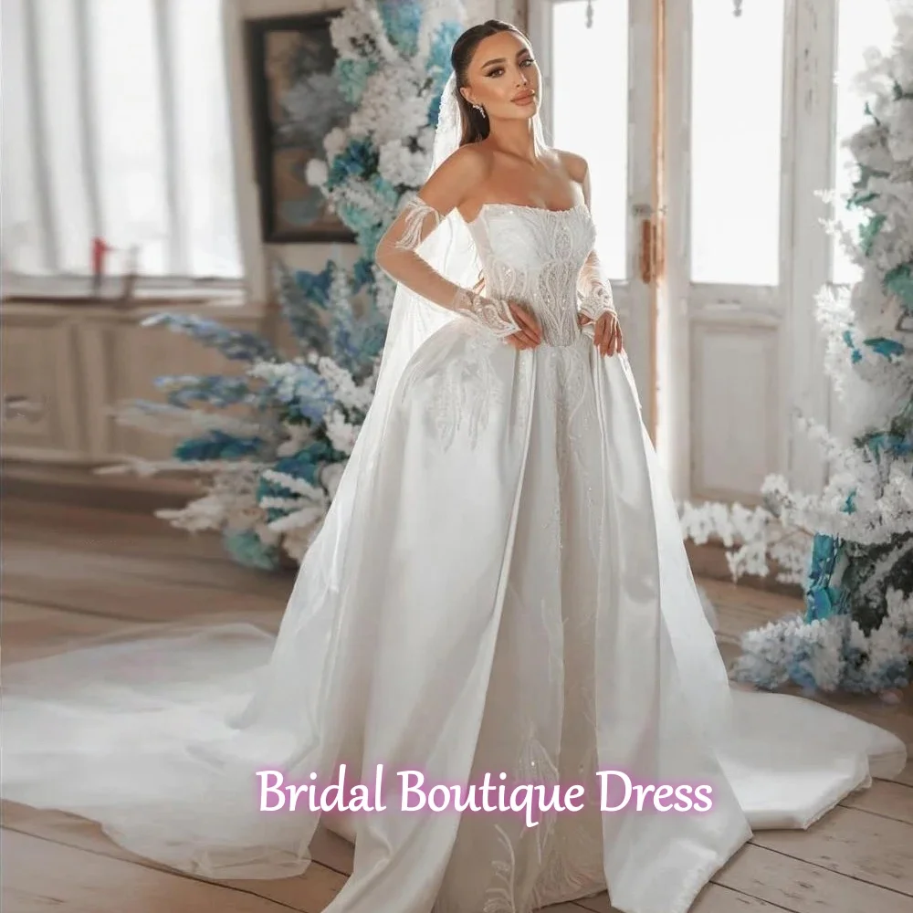 فساتين زفاف نسائية رائعة مخصصة على شكل حرف A مزينة بالدانتيل بدون ظهر رداء العروس بأكمام طويلة فيستدو دي نوفيا