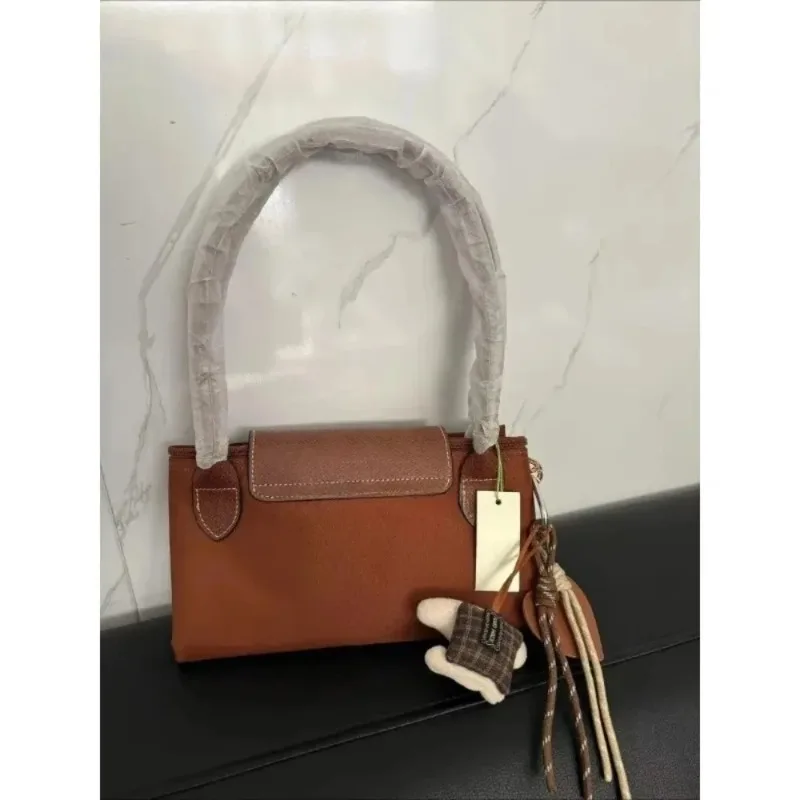 

Large French Style Nylon Mommy Bag 2025 Popular Soft Classic Pendant Women Tote Multi functional Main Bag Commuter