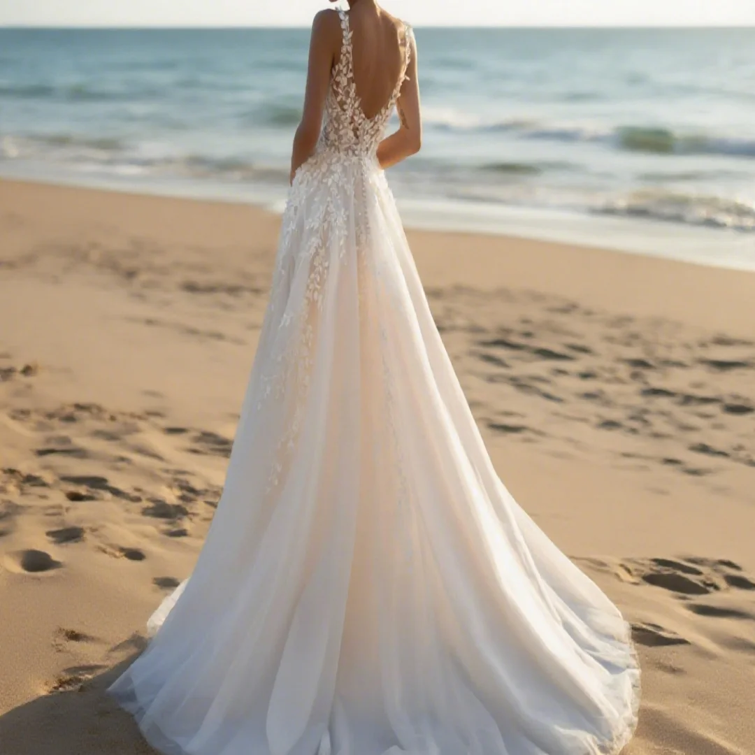 Customized Bohemian-style sleeveless V-neck wedding dress with shoulder embroidery and lace. Formal wedding dress for brides.