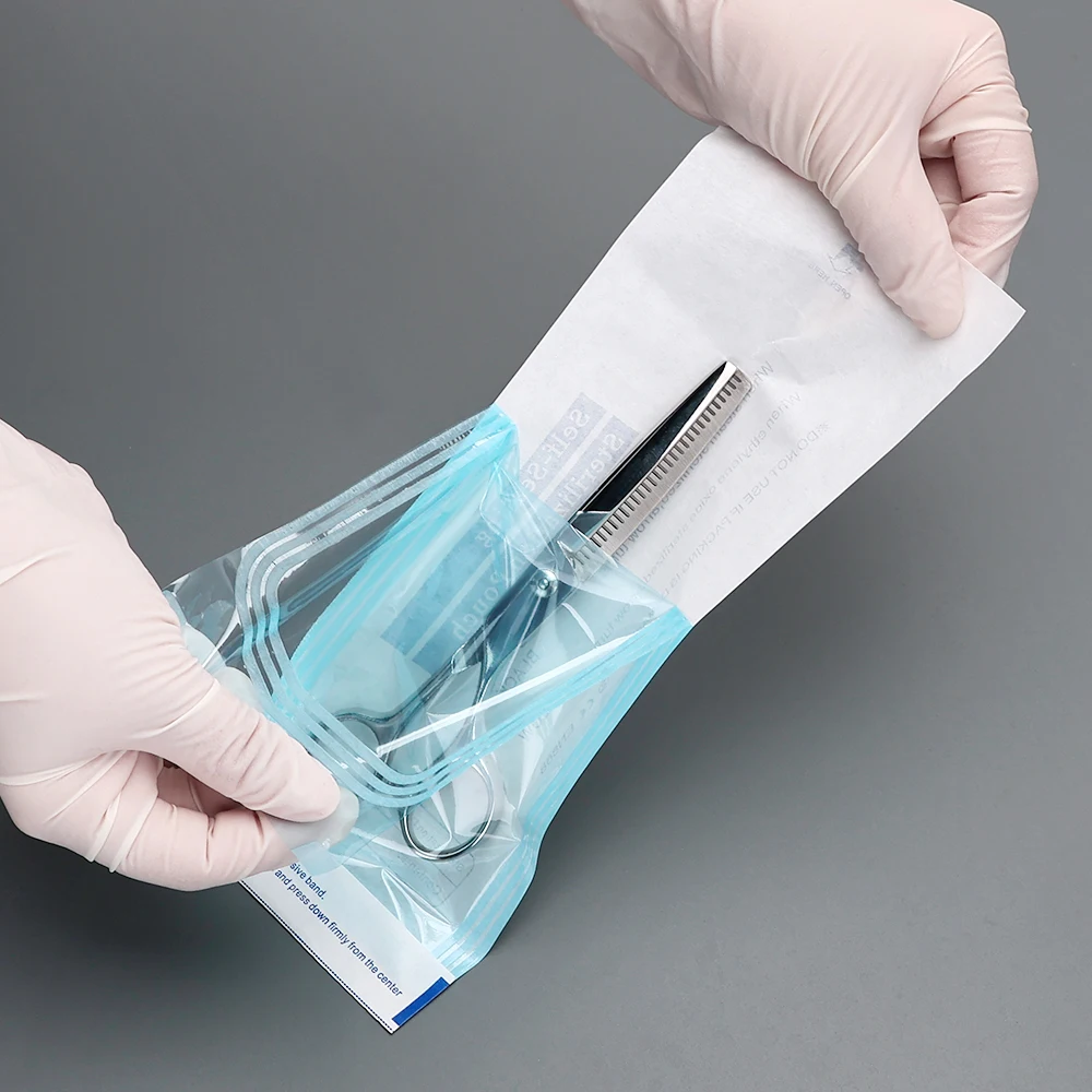 200 ชิ้นถุงฆ่าเชื้อแบบปิดผนึกเองกรรไกรเครื่องโกนหนวดถุงฆ่าเชื้อแบบใช้แล้วทิ้งตัดผมเครื่องมือฆ่าเชื้ออุปกรณ์เครื่องมือ