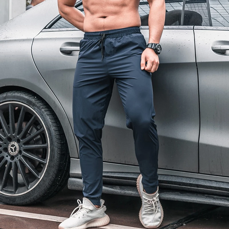 Mannen Sport Broek Met Zakken Running Workout Broek Quick Dry Training Jogger Joggingbroek Hoge Kwaliteit Fitness Bodems