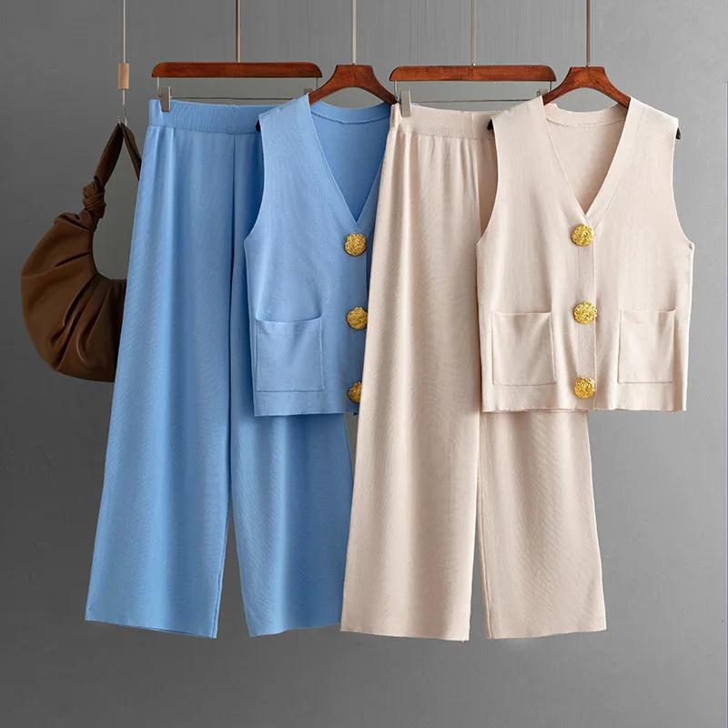 

Модный вязаный свитер с манжетами на пуговицах, широкие брюки, повседневный комплект из двух предметов для женщин, однотонный полиэстер...