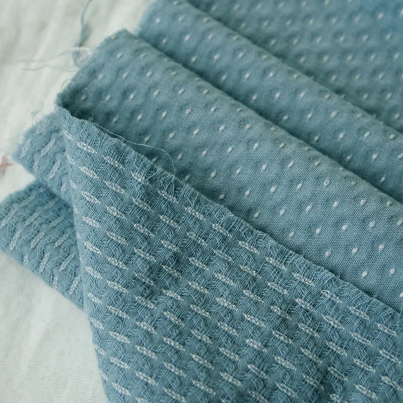 50 cm süße Schneesamen Stickerei Dot Jacquard Baumwollstoff Retro Kinderkleidung Puppenkleidung handgemachte DIY Stoff 140 cm breit