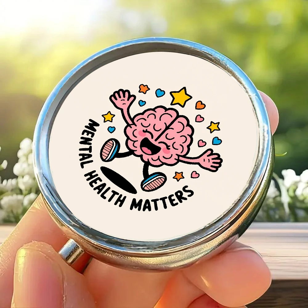 Flat-Packed Pill Box Featuring a Brain Design That Highlights Mental Health, with a Cheerful Pink Brain Shape, Featuring Arms, Stars, and Hearts. It Has Three Compartments, Portable and Safe.