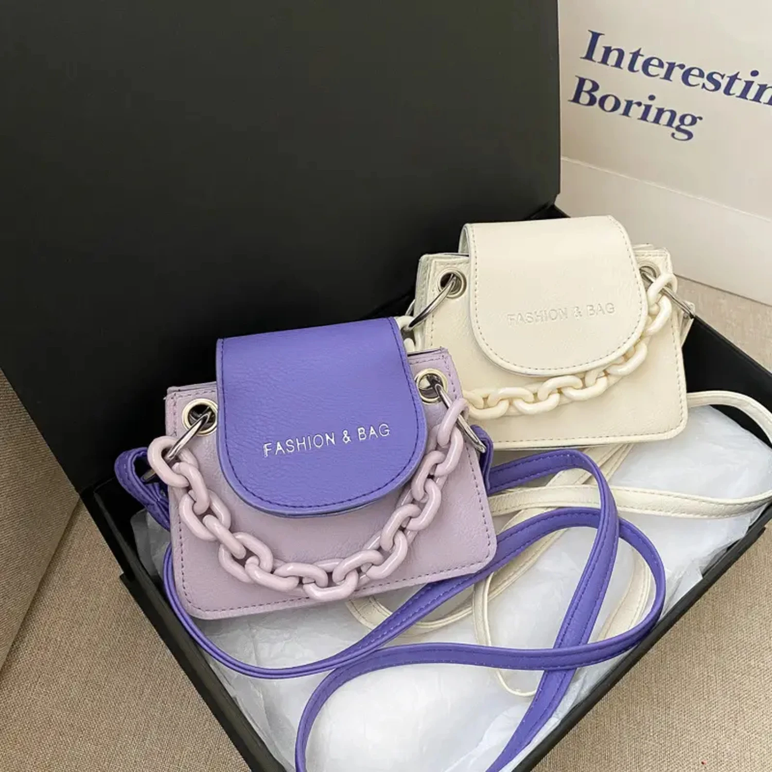 

Stylish and chic, this compact mini crossbody bag is the perfect accessory for any outfit. Featuring a stylish chain decor, this