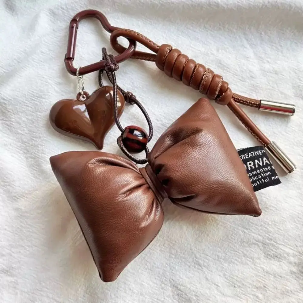 

Brown Leather Baseball Key Chains Hanging Rope Y2k Vintage Bag Pendant Charms Bow Heart Pendant Tennis Woven Rope Keychain