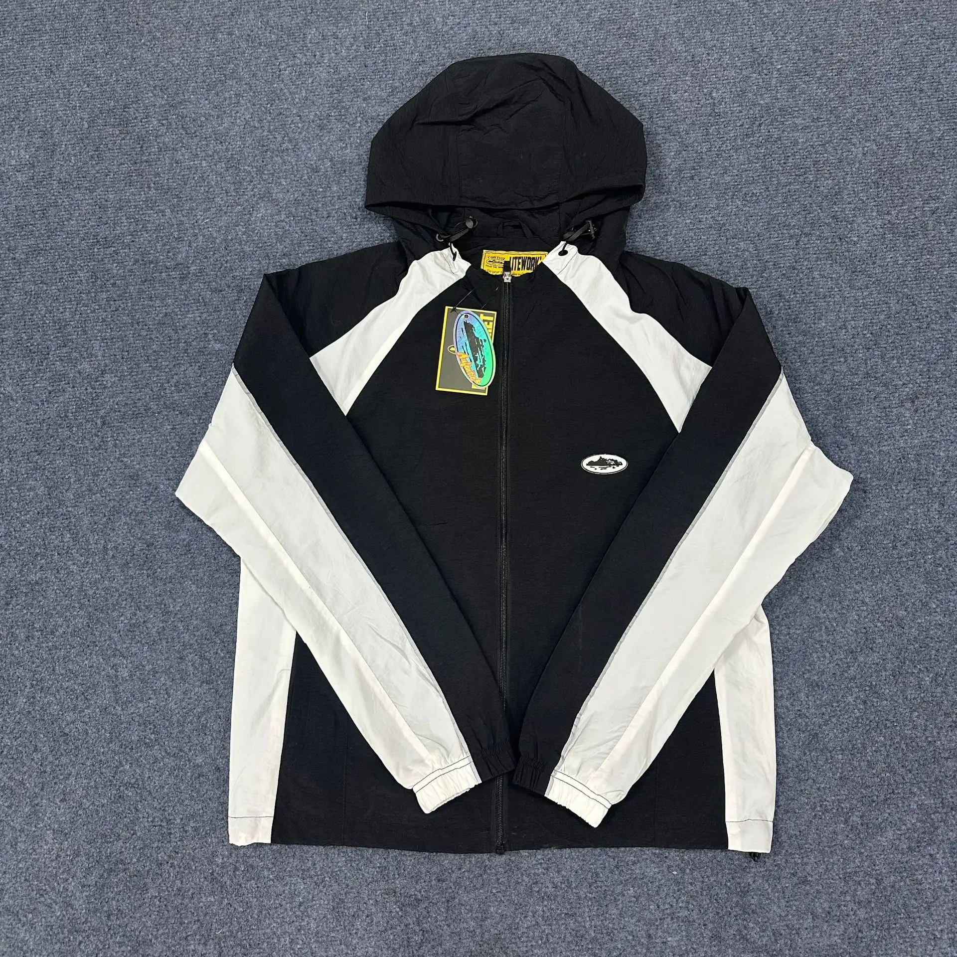 Herfst dunne set met kleurblokken en geborduurde badge voor zowel mannen als vrouwen, hoogwaardige windbreaker.