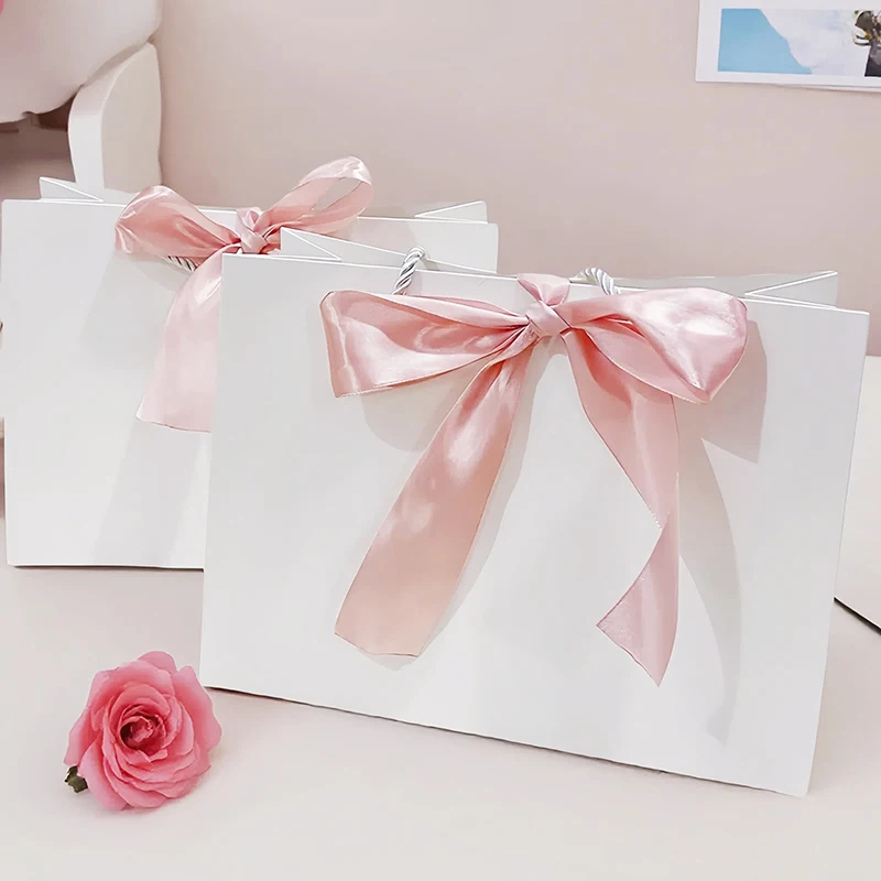 10 Uds. Bolsas de papel de regalo con cinta, recuerdos de boda, Baby Shower, Navidad, fiesta de cumpleaños/pijamas, ropa, peluca, bolsa de embalaje de joyería