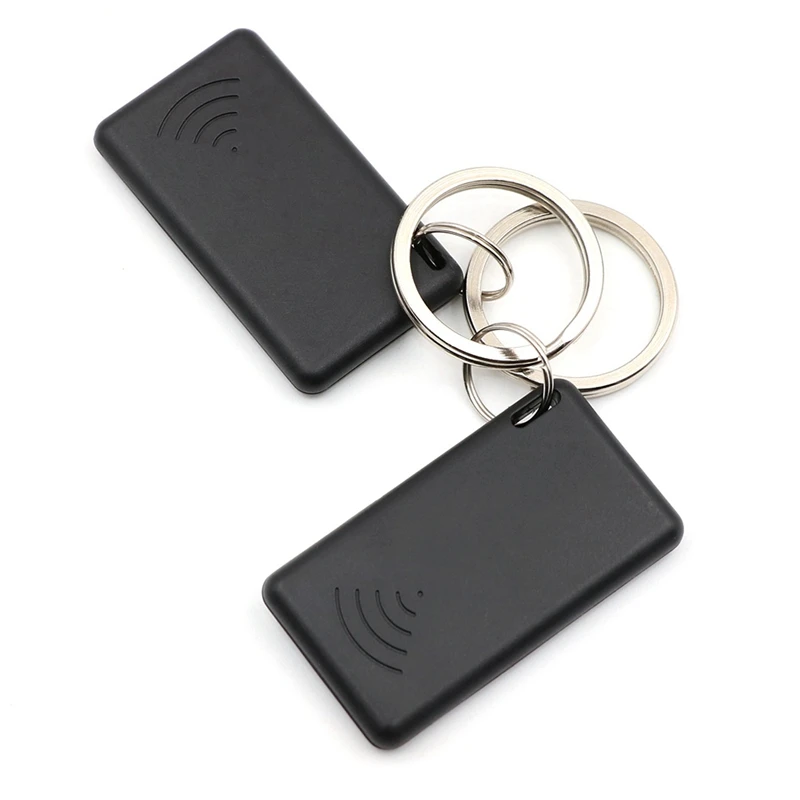 12V ล็อคลับอัจฉริยะอัตโนมัติป้องกันการโจรกรรมอุปกรณ์พลาสติกสีดำ2.4GHz RFID ล็อคเครื่องยนต์ทำให้เคลื่อนที่ไม่ได้อัจฉริยะ