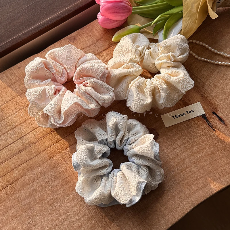 Ballet-Inspired Lace Scrunchie for Women - Elegant and Playful Design, Adds a Chic Touch to Your Look.