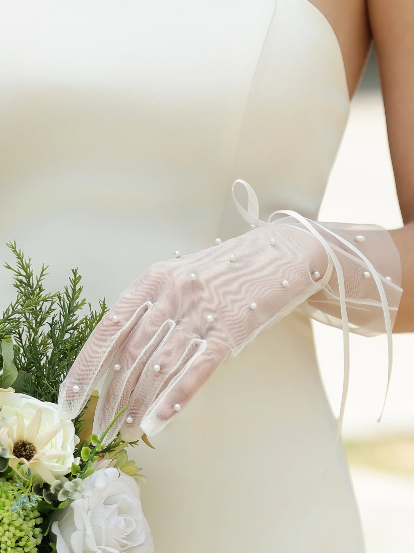 Handmade beaded white wedding gloves