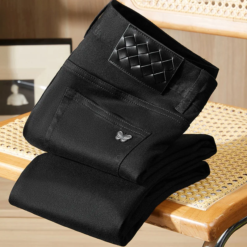 Pure black jeans men's 2025 new light luxury fashion spring and summer versatile elastic slim fit small straight leg pants