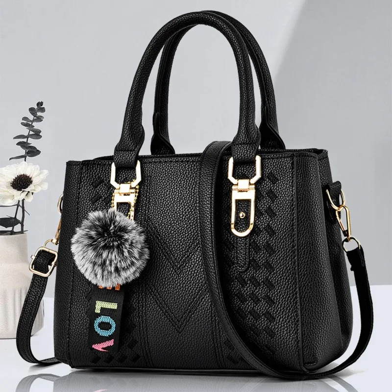 

Women's handbag, 2026 new style, pom-pom charm, simple shoulder/crossbody bag.