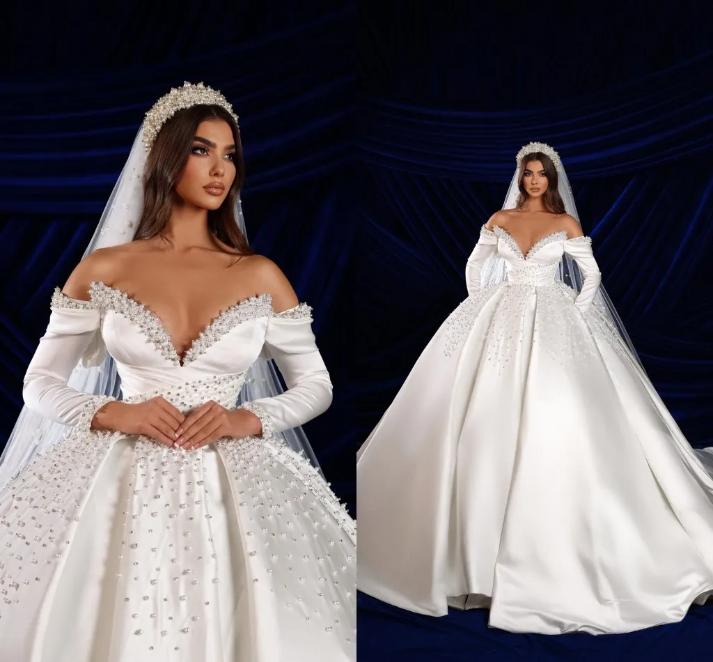 

Customized Sparkly Handwork Perls Off The Shoulder Wedding Dresses Sweep Train Plus Size Satin Ballgown Long Sleeve Bridal Gown