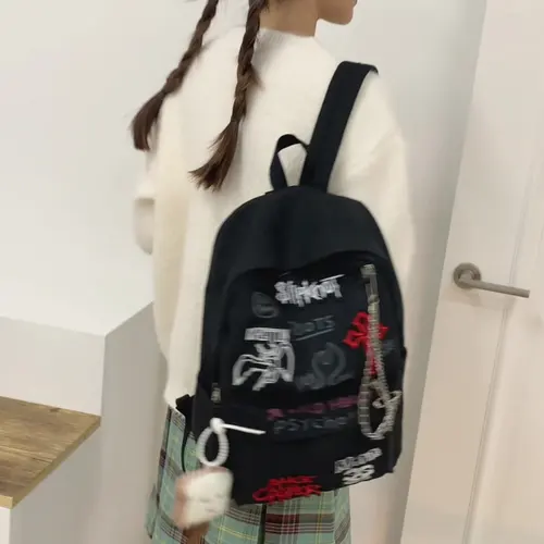 Imagen 1 del producto Mochila Gothic Rock para hombres y mujeres Mochila informal de lona de gran capacidad con detalles de metal y patchwork para uso diario