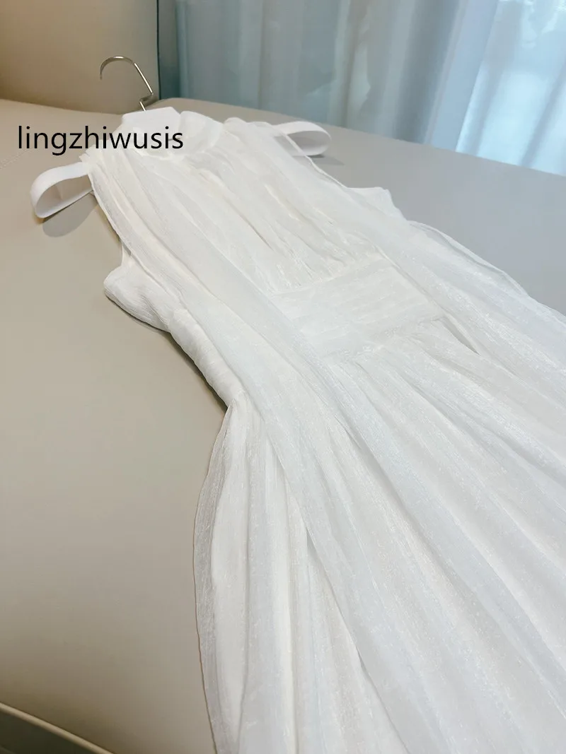 Lingzhiwusi-Vestido largo blanco para mujer, vestidos de cuello Halter, hada elegante de diseñador, alta calidad, vacaciones en la orilla del mar, recién llegado