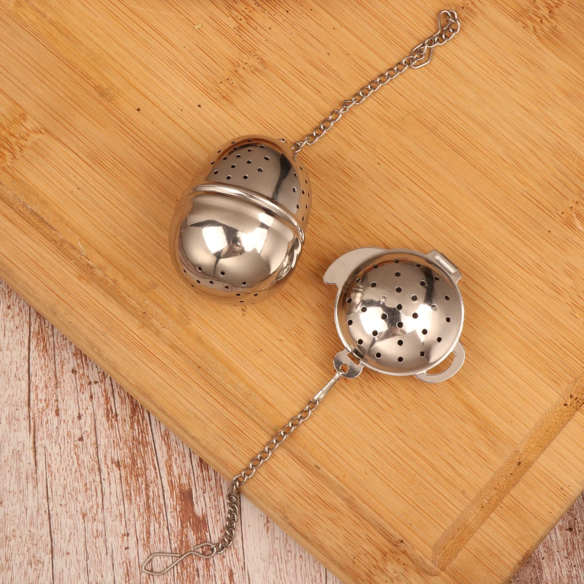 

2pcs Stainless Steel Infuser Loose Leaf Tea Filter Strainer For Home Office Egg Shape Teapot Design Reusable Mesh Infuser
