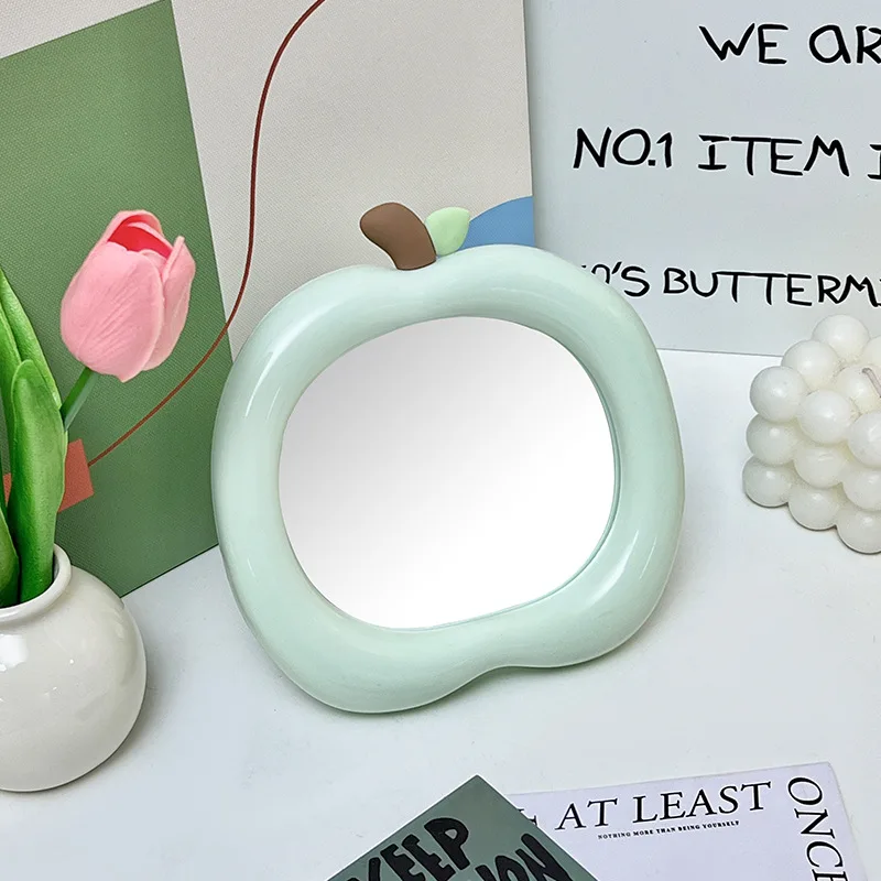 กระจกโต๊ะเครื่องแป้งรูปทรงผลไม้ขาตั้งขนาดกะทัดรัดแบบพกพาสำหรับศึกษาสำนักงานแต่งหน้าตัวเลือกที่ชัดเจนตกแต่งบ้าน